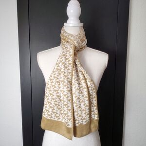 Michael Kors scarf, featuring the iconic MK monogram pattern